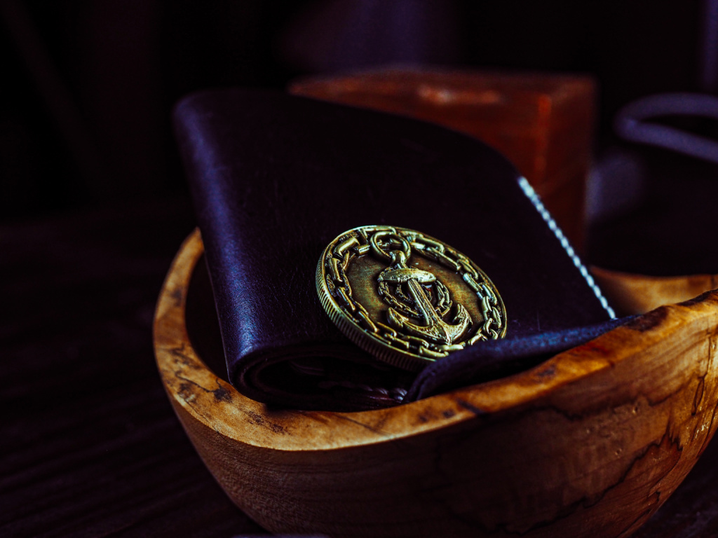 Leather bifold wallet and Lapira Productions Challenge Coin